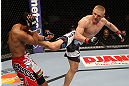SEATTLE, WA - DECEMBER 08:  (R-L) Dennis Siver kicks Nam Phan during their featherweight bout at the UFC on FOX event on December 8, 2012  at Key Arena in Seattle, Washington.  (Photo by Ezra Shaw/Zuffa LLC/Zuffa LLC via Getty Images) *** Local Caption *** Dennis Siver; Nam Phan