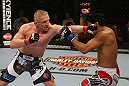 SEATTLE, WA - DECEMBER 08:  (L-R) Dennis Siver punches Nam Phan during their featherweight bout at the UFC on FOX event on December 8, 2012  at Key Arena in Seattle, Washington.  (Photo by Ezra Shaw/Zuffa LLC/Zuffa LLC via Getty Images) *** Local Caption *** Dennis Siver; Nam Phan