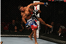 SEATTLE, WA - DECEMBER 08:  Marcus LeVesseur (L) lifts Abel Trujillo during their lightweight bout at the UFC on FOX event on December 8, 2012  at Key Arena in Seattle, Washington.  (Photo by Ezra Shaw/Zuffa LLC/Zuffa LLC via Getty Images) *** Local Caption *** Marcus LeVesseur; Abel Trujillo