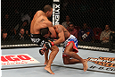 SEATTLE, WA - DECEMBER 08:  Abel Trujillo (black shorts) attempts to submit Marcus LeVesseur during their lightweight bout at the UFC on FOX event on December 8, 2012  at Key Arena in Seattle, Washington.  (Photo by Ezra Shaw/Zuffa LLC/Zuffa LLC via Getty Images) *** Local Caption *** Marcus LeVesseur; Abel Trujillo