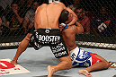 SEATTLE, WA - DECEMBER 08:  Abel Trujillo (black shorts) attempts to submit Marcus LeVesseur during their lightweight bout at the UFC on FOX event on December 8, 2012  at Key Arena in Seattle, Washington.  (Photo by Ezra Shaw/Zuffa LLC/Zuffa LLC via Getty Images) *** Local Caption *** Marcus LeVesseur; Abel Trujillo