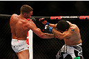SEATTLE, WA - DECEMBER 08:  (L-R) Daron Cruickshank kicks Henry Martinez  during their lightweight bout at the UFC on FOX event on December 8, 2012  at Key Arena in Seattle, Washington.  (Photo by Ezra Shaw/Zuffa LLC/Zuffa LLC via Getty Images) *** Local Caption *** Daron Cruickshank; Henry Martinez