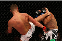SEATTLE, WA - DECEMBER 08:  (L-R) Daron Cruickshank kicks Henry Martinez  during their lightweight bout at the UFC on FOX event on December 8, 2012  at Key Arena in Seattle, Washington.  (Photo by Ezra Shaw/Zuffa LLC/Zuffa LLC via Getty Images) *** Local Caption *** Daron Cruickshank; Henry Martinez