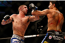 SEATTLE, WA - DECEMBER 08:  (L-R) Joe Proctor punches Ramsey Nijem during their lightweight bout at the UFC on FOX event on December 8, 2012  at Key Arena in Seattle, Washington.  (Photo by Josh Hedges/Zuffa LLC/Zuffa LLC via Getty Images) *** Local Caption *** Ramsey Nijem; Joe Proctor
