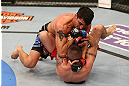 SEATTLE, WA - DECEMBER 08:  Ramsey Nijem (top) elbows Joe Proctor during their lightweight bout at the UFC on FOX event on December 8, 2012  at Key Arena in Seattle, Washington.  (Photo by Ezra Shaw/Zuffa LLC/Zuffa LLC via Getty Images) *** Local Caption *** Ramsey Nijem; Joe Proctor
