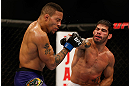 SEATTLE, WA - DECEMBER 08:  (R-L) Raphael Assuncao punches Mike Easton during their bantamweight bout at the UFC on FOX event on December 8, 2012  at Key Arena in Seattle, Washington.  (Photo by Ezra Shaw/Zuffa LLC/Zuffa LLC via Getty Images) *** Local Caption *** Raphael Assuncao; Mike Easton
