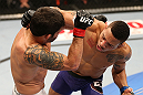 SEATTLE, WA - DECEMBER 08:  (R-L) Mike Easton punches Raphael Assuncao during their bantamweight bout at the UFC on FOX event on December 8, 2012  at Key Arena in Seattle, Washington.  (Photo by Ezra Shaw/Zuffa LLC/Zuffa LLC via Getty Images) *** Local Caption *** Raphael Assuncao; Mike Easton