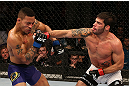SEATTLE, WA - DECEMBER 08:  [CAPTION] during their bantamweight bout at the UFC on FOX event on December 8, 2012  at Key Arena in Seattle, Washington.  (Photo by Ezra Shaw/Zuffa LLC/Zuffa LLC via Getty Images) *** Local Caption *** Raphael Assuncao; Mike Easton