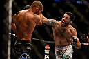SEATTLE, WA - DECEMBER 08:  (R-L) Matt Brown punches Mike Swick during their welterweight bout at the UFC on FOX event on December 8, 2012  at Key Arena in Seattle, Washington.  (Photo by Ezra Shaw/Zuffa LLC/Zuffa LLC via Getty Images) *** Local Caption *** Mike Swick; Matt Brown