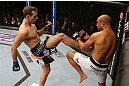SEATTLE, WA - DECEMBER 08:  (L-R) Rory MacDonald kicks BJ Penn during their welterweight bout at the UFC on FOX event on December 8, 2012  at Key Arena in Seattle, Washington.  (Photo by Ezra Shaw/Zuffa LLC/Zuffa LLC via Getty Images) *** Local Caption *** BJ Penn; Rory MacDonald
