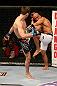 SEATTLE, WA - DECEMBER 08:  (L-R) Rory MacDonald kicks BJ Penn during their welterweight bout at the UFC on FOX event on December 8, 2012  at Key Arena in Seattle, Washington.  (Photo by Ezra Shaw/Zuffa LLC/Zuffa LLC via Getty Images) *** Local Caption *** BJ Penn; Rory MacDonald