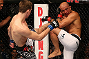 SEATTLE, WA - DECEMBER 08:  (L-R) Rory MacDonald kicks BJ Penn during their welterweight bout at the UFC on FOX event on December 8, 2012  at Key Arena in Seattle, Washington.  (Photo by Ezra Shaw/Zuffa LLC/Zuffa LLC via Getty Images) *** Local Caption *** BJ Penn; Rory MacDonald
