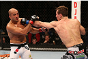 SEATTLE, WA - DECEMBER 08:  (R-L) Rory MacDonald punches BJ Penn during their welterweight bout at the UFC on FOX event on December 8, 2012  at Key Arena in Seattle, Washington.  (Photo by Ezra Shaw/Zuffa LLC/Zuffa LLC via Getty Images) *** Local Caption *** BJ Penn; Rory MacDonald