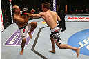 SEATTLE, WA - DECEMBER 08:  (R-L) Rory MacDonald punches BJ Penn during their welterweight bout at the UFC on FOX event on December 8, 2012  at Key Arena in Seattle, Washington.  (Photo by Ezra Shaw/Zuffa LLC/Zuffa LLC via Getty Images) *** Local Caption *** BJ Penn; Rory MacDonald