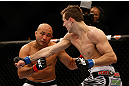 SEATTLE, WA - DECEMBER 08:  (R-L) Rory MacDonald punches BJ Penn during their welterweight bout at the UFC on FOX event on December 8, 2012  at Key Arena in Seattle, Washington.  (Photo by Josh Hedges/Zuffa LLC/Zuffa LLC via Getty Images) *** Local Caption *** BJ Penn; Rory MacDonald