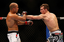 SEATTLE, WA - DECEMBER 08:  (R-L) Rory MacDonald punches BJ Penn during their welterweight bout at the UFC on FOX event on December 8, 2012  at Key Arena in Seattle, Washington.  (Photo by Josh Hedges/Zuffa LLC/Zuffa LLC via Getty Images) *** Local Caption *** BJ Penn; Rory MacDonald