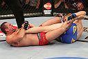 SEATTLE, WA - DECEMBER 08:  (L-R) Mauricio Rua attempts to submit Alexander Gustafsson during their light heavyweight bout at the UFC on FOX event on December 8, 2012  at Key Arena in Seattle, Washington.  (Photo by Ezra Shaw/Zuffa LLC/Zuffa LLC via Getty Images) *** Local Caption *** Mauricio Rua; Alexander Gustafsson