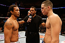 SEATTLE, WA - DECEMBER 08:  Benson Henderson (left) and Nate Diaz (right) stare eachother down before their lightweight championship bout at the UFC on FOX event on December 8, 2012  at Key Arena in Seattle, Washington.  (Photo by Josh Hedges/Zuffa LLC/Zuffa LLC via Getty Images) *** Local Caption *** Benson Henderson; Nate Diaz