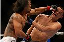 SEATTLE, WA - DECEMBER 08:  Benson Henderson (L) punches Nate Diaz (R) during their lightweight championship bout at the UFC on FOX event on December 8, 2012  at Key Arena in Seattle, Washington.  (Photo by Josh Hedges/Zuffa LLC/Zuffa LLC via Getty Images) *** Local Caption *** Benson Henderson; Nate Diaz