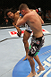 SEATTLE, WA - DECEMBER 08:  Benson Henderson (white trunks) kicks Nate Diaz during their lightweight championship bout at the UFC on FOX event on December 8, 2012  at Key Arena in Seattle, Washington.  (Photo by Ezra Shaw/Zuffa LLC/Zuffa LLC via Getty Images) *** Local Caption *** Benson Henderson; Nate Diaz