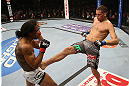SEATTLE, WA - DECEMBER 08:  (R-L) Nate Diaz kicks Benson Henderson during their lightweight championship bout at the UFC on FOX event on December 8, 2012  at Key Arena in Seattle, Washington.  (Photo by Ezra Shaw/Zuffa LLC/Zuffa LLC via Getty Images) *** Local Caption *** Benson Henderson; Nate Diaz