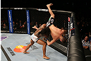 SEATTLE, WA - DECEMBER 08:  Benson Henderson (left) slams Nate Diaz (right) during their lightweight championship bout at the UFC on FOX event on December 8, 2012  at Key Arena in Seattle, Washington.  (Photo by Ezra Shaw/Zuffa LLC/Zuffa LLC via Getty Images) *** Local Caption *** Benson Henderson; Nate Diaz