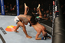 SEATTLE, WA - DECEMBER 08:  Benson Henderson (left) slams Nate Diaz (right) during their lightweight championship bout at the UFC on FOX event on December 8, 2012  at Key Arena in Seattle, Washington.  (Photo by Ezra Shaw/Zuffa LLC/Zuffa LLC via Getty Images) *** Local Caption *** Benson Henderson; Nate Diaz