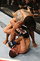 SEATTLE, WA - DECEMBER 08:  Benson Henderson (top) punches Nate Diaz during their lightweight championship bout at the UFC on FOX event on December 8, 2012  at Key Arena in Seattle, Washington.  (Photo by Ezra Shaw/Zuffa LLC/Zuffa LLC via Getty Images) *** Local Caption *** Benson Henderson; Nate Diaz