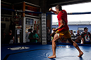 GOLD COAST, AUSTRALIA - DECEMBER 13:  Robert Whittaker works out for the media during the UFC on FX open workouts on December 13, 2012 at Boonchu Gym in Gold Coast, Australia.  (Photo by Josh Hedges/Zuffa LLC/Zuffa LLC via Getty Images)