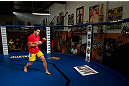 GOLD COAST, AUSTRALIA - DECEMBER 13:  Robert Whittaker works out for the media during the UFC on FX open workouts on December 13, 2012 at Boonchu Gym in Gold Coast, Australia.  (Photo by Josh Hedges/Zuffa LLC/Zuffa LLC via Getty Images)