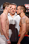 GOLD COAST, AUSTRALIA - DECEMBER 14:  (L-R) Opponents Brendan Loughnane and Mike Wilkinson face off during the UFC on FX weigh in on December 14, 2012 at Gold Coast Convention and Exhibition Centre in Gold Coast, Queensland, Australia.  (Photo by Josh Hedges/Zuffa LLC/Zuffa LLC via Getty Images)