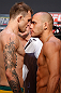 GOLD COAST, AUSTRALIA - DECEMBER 14:  (L-R) Opponents Benny Alloway and Manuel Rodriguez face off during the UFC on FX weigh in on December 14, 2012 at Gold Coast Convention and Exhibition Centre in Gold Coast, Queensland, Australia.  (Photo by Josh Hedges/Zuffa LLC/Zuffa LLC via Getty Images)