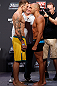 GOLD COAST, AUSTRALIA - DECEMBER 14:  (L-R) Opponents Benny Alloway and Manuel Rodriguez face off during the UFC on FX weigh in on December 14, 2012 at Gold Coast Convention and Exhibition Centre in Gold Coast, Queensland, Australia.  (Photo by Josh Hedges/Zuffa LLC/Zuffa LLC via Getty Images)