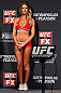 GOLD COAST, AUSTRALIA - DECEMBER 14:  UFC Octagon Girl Kahili Blundell stands on stage during the UFC on FX weigh in on December 14, 2012 at Gold Coast Convention and Exhibition Centre in Gold Coast, Queensland, Australia.  (Photo by Josh Hedges/Zuffa LLC/Zuffa LLC via Getty Images)
