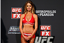GOLD COAST, AUSTRALIA - DECEMBER 14:  UFC Octagon Girl Kahili Blundell stands on stage during the UFC on FX weigh in on December 14, 2012 at Gold Coast Convention and Exhibition Centre in Gold Coast, Queensland, Australia.  (Photo by Josh Hedges/Zuffa LLC/Zuffa LLC via Getty Images)