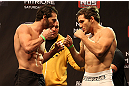 LAS VEGAS, NV - DECEMBER 14:  (L-R) Mike Rio and John Cofer face off during TUF 16 Finale weigh in on December 14, 2012  at the Joint at the Hard Rock in Las Vegas, Nevada.  (Photo by Jim Kemper/Zuffa LLC/Zuffa LLC via Getty Images)