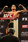 LAS VEGAS, NV - DECEMBER 14:  Reuben Duran steps onto the scale during TUF 16 Finale weigh in on December 14, 2012  at the Joint at the Hard Rock in Las Vegas, Nevada.  (Photo by Jim Kemper/Zuffa LLC/Zuffa LLC via Getty Images)