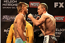 LAS VEGAS, NV - DECEMBER 14:  (L-R) Mike Pyle and James Head face off during TUF 16 Finale weigh in on December 14, 2012  at the Joint at the Hard Rock in Las Vegas, Nevada.  (Photo by Jim Kemper/Zuffa LLC/Zuffa LLC via Getty Images)