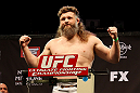 LAS VEGAS, NV - DECEMBER 14:  Roy Nelson stands on the scale during TUF 16 Finale weigh in on December 14, 2012  at the Joint at the Hard Rock in Las Vegas, Nevada.  (Photo by Jim Kemper/Zuffa LLC/Zuffa LLC via Getty Images)