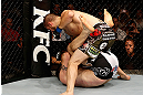 GOLD COAST, AUSTRALIA - DECEMBER 15:  (R-L) Cody Donovan punches Nick Penner during their light heavyweight fight at the UFC on FX event on December 15, 2012  at Gold Coast Convention and Exhibition Centre in Gold Coast, Australia.  (Photo by Josh Hedges/Zuffa LLC/Zuffa LLC via Getty Images)