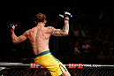 GOLD COAST, AUSTRALIA - DECEMBER 15:  Benny Alloway reacts after knocking out Manuel Rodriguez during their welterweight fight at the UFC on FX event on December 15, 2012  at Gold Coast Convention and Exhibition Centre in Gold Coast, Australia.  (Photo by Josh Hedges/Zuffa LLC/Zuffa LLC via Getty Images)