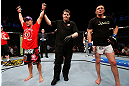GOLD COAST, AUSTRALIA - DECEMBER 15:  Mike Pierce (L) reacts after defeating Seth Baczynski during their welterweight fight at the UFC on FX event on December 15, 2012  at Gold Coast Convention and Exhibition Centre in Gold Coast, Australia.  (Photo by Josh Hedges/Zuffa LLC/Zuffa LLC via Getty Images)
