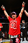 GOLD COAST, AUSTRALIA - DECEMBER 15:  Mike Pierce reacts after defeating Seth Baczynski during their welterweight fight at the UFC on FX event on December 15, 2012  at Gold Coast Convention and Exhibition Centre in Gold Coast, Australia.  (Photo by Josh Hedges/Zuffa LLC/Zuffa LLC via Getty Images)