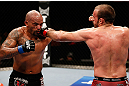 GOLD COAST, AUSTRALIA - DECEMBER 15:  (R-L) Igor Pokrajac punches Joey Beltran during their light heavyweight fight at the UFC on FX event on December 15, 2012  at Gold Coast Convention and Exhibition Centre in Gold Coast, Australia.  (Photo by Josh Hedges/Zuffa LLC/Zuffa LLC via Getty Images)