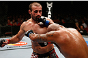 GOLD COAST, AUSTRALIA - DECEMBER 15:  (R-L) Joey Beltran punches Igor Pokrajac during their light heavyweight fight at the UFC on FX event on December 15, 2012  at Gold Coast Convention and Exhibition Centre in Gold Coast, Australia.  (Photo by Josh Hedges/Zuffa LLC/Zuffa LLC via Getty Images)