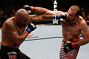 GOLD COAST, AUSTRALIA - DECEMBER 15:  (L-R) Joey Beltran punches Igor Pokrajac during their light heavyweight fight at the UFC on FX event on December 15, 2012  at Gold Coast Convention and Exhibition Centre in Gold Coast, Australia.  (Photo by Josh Hedges/Zuffa LLC/Zuffa LLC via Getty Images)