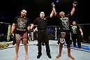 GOLD COAST, AUSTRALIA - DECEMBER 15:  Joey Beltran (R) reacts after defeating Igor Pokrajac during their light heavyweight fight at the UFC on FX event on December 15, 2012  at Gold Coast Convention and Exhibition Centre in Gold Coast, Australia.  (Photo by Josh Hedges/Zuffa LLC/Zuffa LLC via Getty Images)