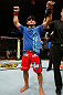 GOLD COAST, AUSTRALIA - DECEMBER 15:  Chad Mendes reacts after knocking out Yaotzin Meza during their featherweight fight at the UFC on FX event on December 15, 2012  at Gold Coast Convention and Exhibition Centre in Gold Coast, Australia.  (Photo by Josh Hedges/Zuffa LLC/Zuffa LLC via Getty Images)