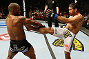 GOLD COAST, AUSTRALIA - DECEMBER 15:  (R-L) Rousimar Palhares kicks Hector Lombard during their middleweight fight at the UFC on FX event on December 15, 2012  at Gold Coast Convention and Exhibition Centre in Gold Coast, Australia.  (Photo by Josh Hedges/Zuffa LLC/Zuffa LLC via Getty Images)
