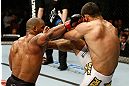 GOLD COAST, AUSTRALIA - DECEMBER 15:  (L-R) Hector Lombard punches Rousimar Palhares during their middleweight fight at the UFC on FX event on December 15, 2012  at Gold Coast Convention and Exhibition Centre in Gold Coast, Australia.  (Photo by Josh Hedges/Zuffa LLC/Zuffa LLC via Getty Images)